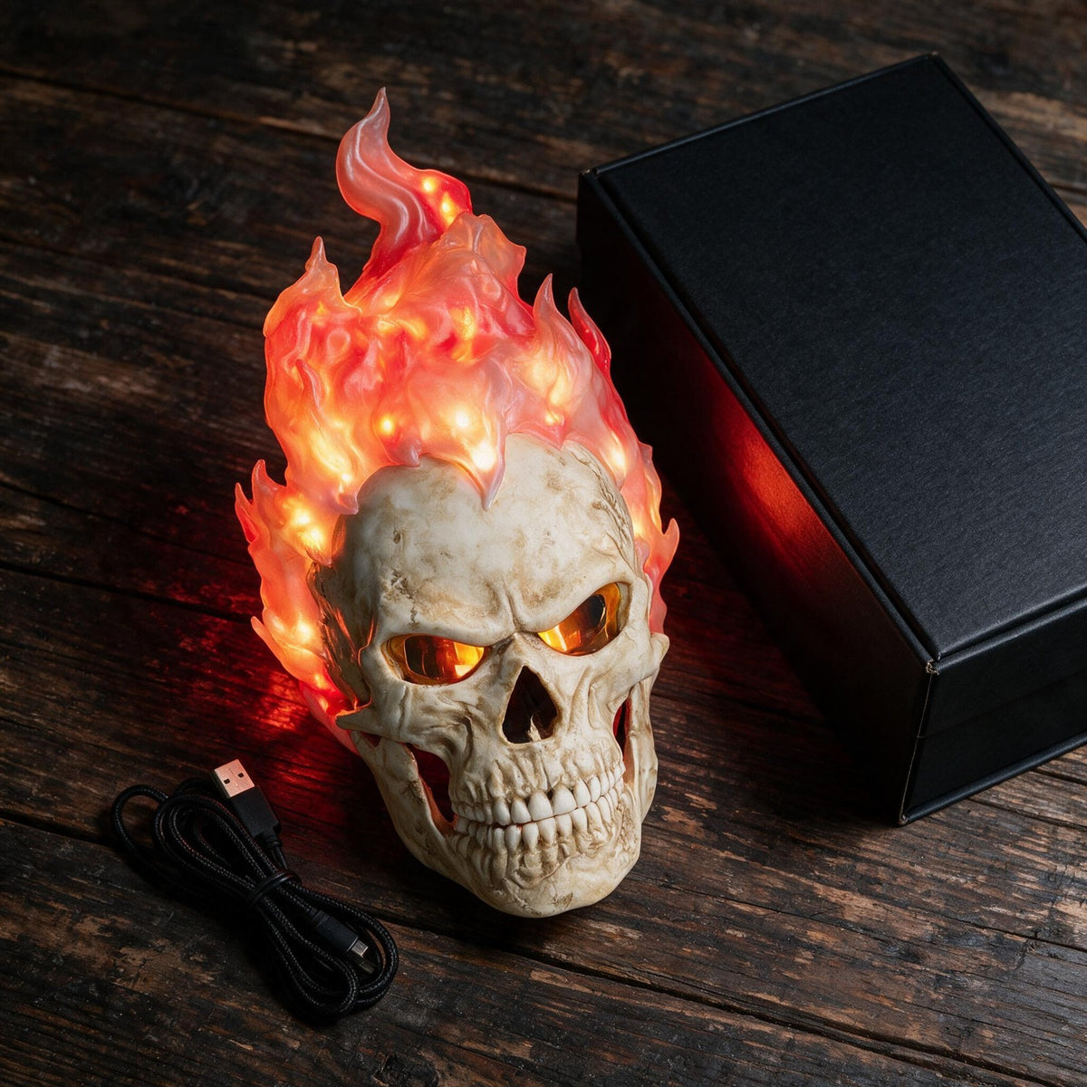 Wrathfire flaming skull mask with its USB charging cable and box